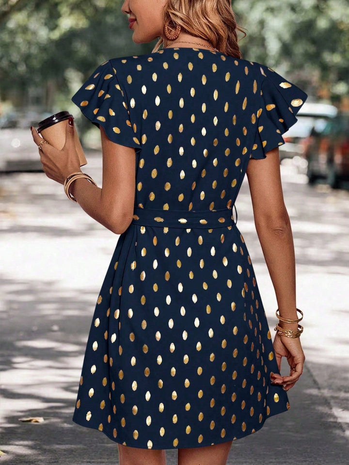 Vestito midi donna a pois, design con vita alta e taglio ad A, perfetto per uno stile casual-elegante.