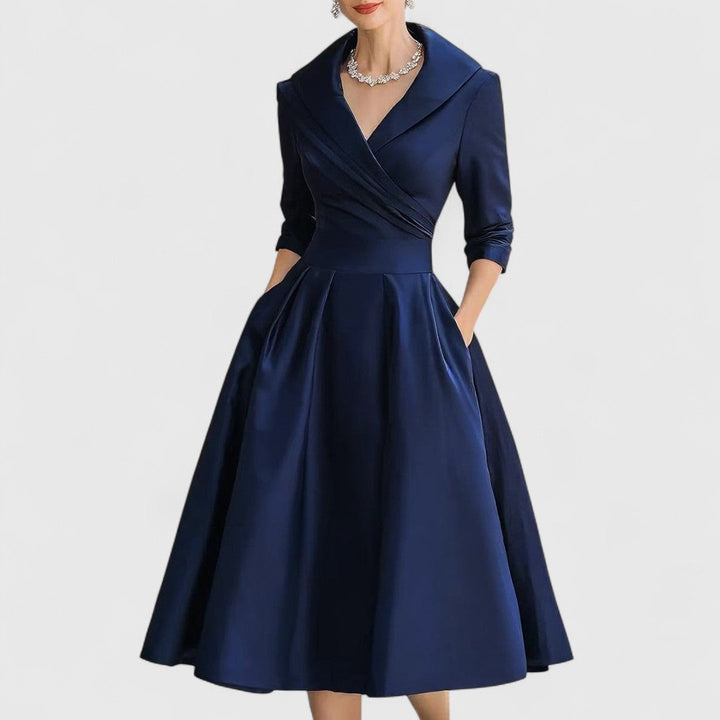 Abito midi donna elegante scollo a V, ideale per eventi e ufficio. Moda femminile con tasche pratiche.