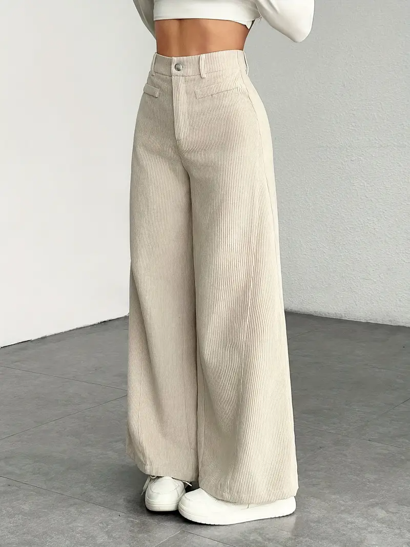 Pantaloni donna vita alta, gamba larga elegante. Perfetti per un look chic e raffinato con comfort assicurato.