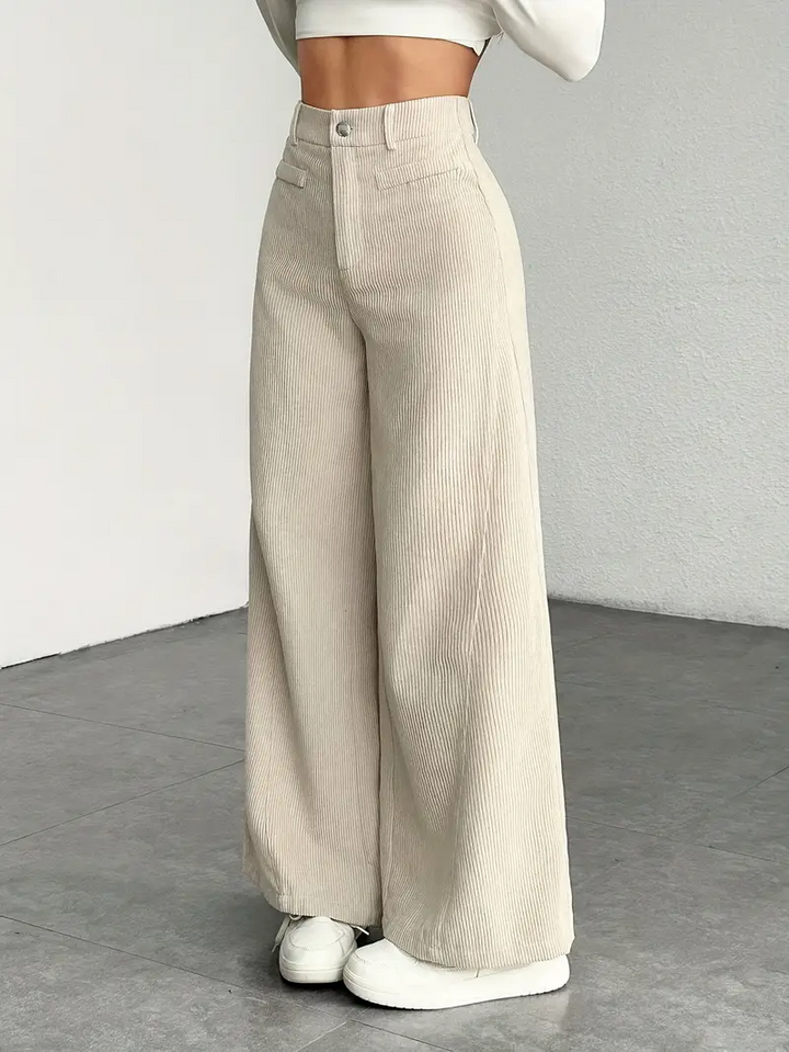 Pantaloni donna vita alta, gamba larga elegante. Perfetti per un look chic e raffinato con comfort assicurato.