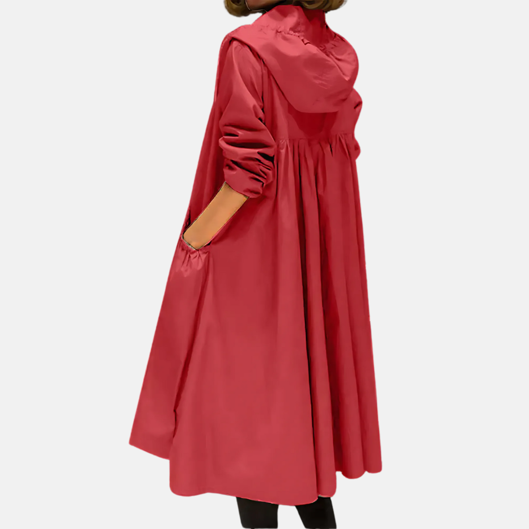 Giacca donna impermeabile e antivento, lunga al ginocchio con cappuccio, protezione elegante per pioggia e vento.