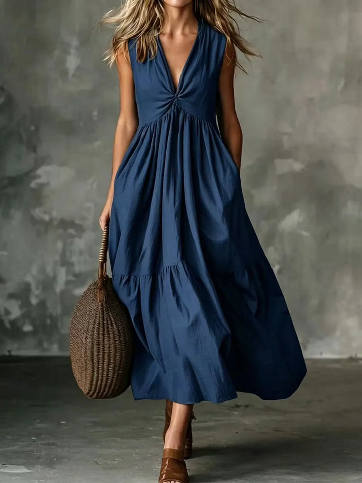 Abito casual midi da donna in misto cotone, scollo a V e senza maniche. Leggero, perfetto per l'estate, con tasche.