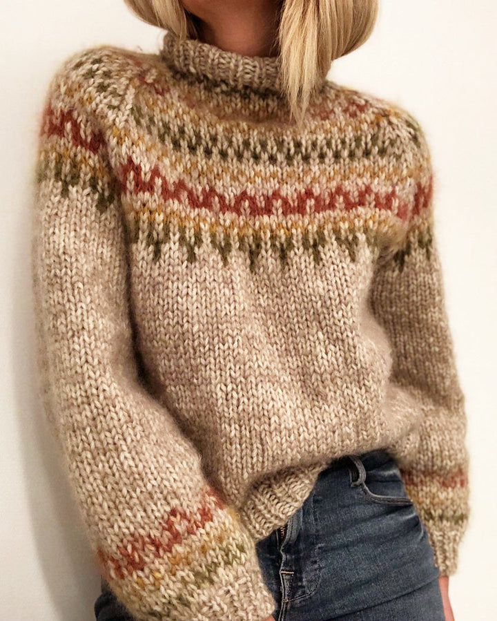 Moda donna autunno/inverno: maglione con stampa geometrica, maniche lunghe, per un look femminile alla moda.