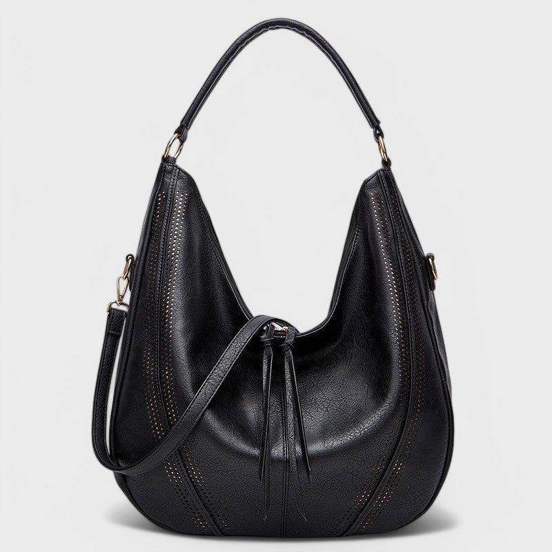 Borsa a tracolla hobo donna, capiente e pratica, stile boho chic, accessorio moda con portafoglio coordinato.
