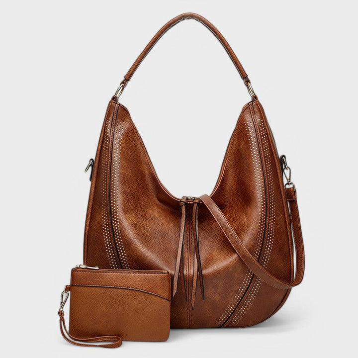 Borsa hobo donna capiente stile bohémien, accessorio moda versatile, con portafoglio e tracolla per casual chic.