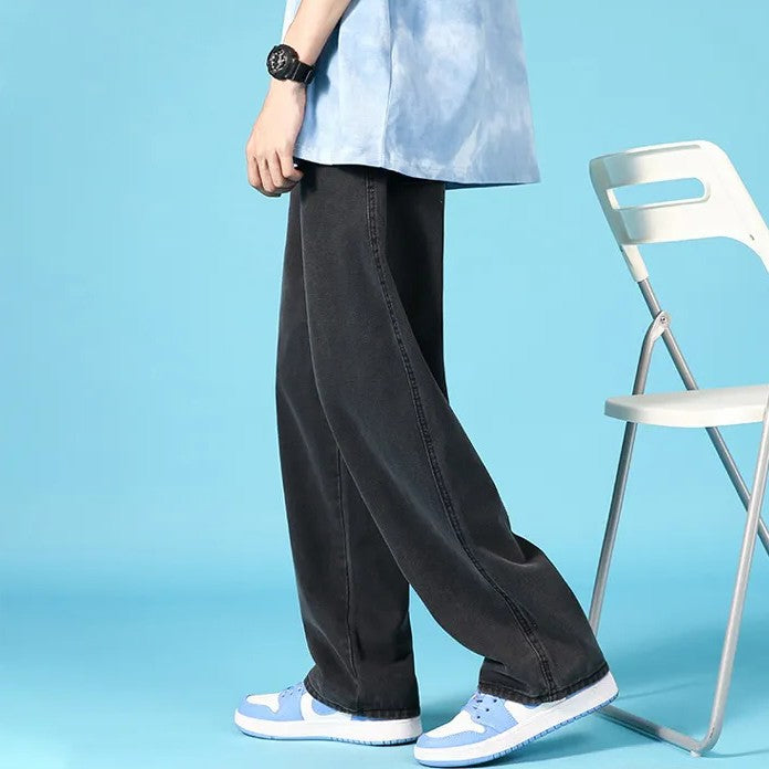 Jeans uomo loose fit a gamba dritta, stile urbano con zip.