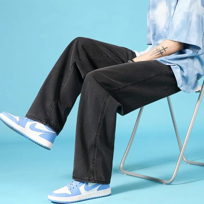 Pantaloni jeans uomo gamba dritta loose fit, stile urbano con zip, massima comodità.