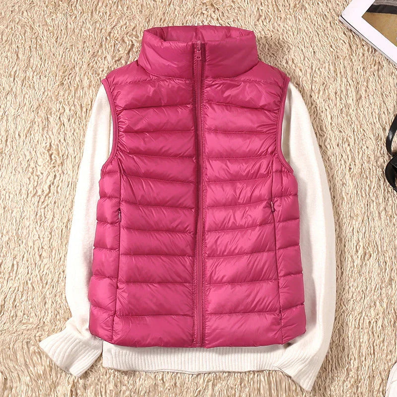 Caldo gilet piumino leggero da donna, senza ingombro, ottimo per sovrapposizioni e attività all'aperto.