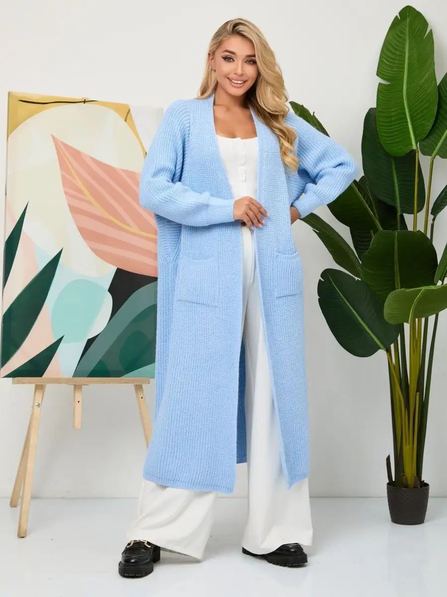 Cardigan lungo donna di moda, elegante e versatile, ideale per outfit autunnali e invernali.