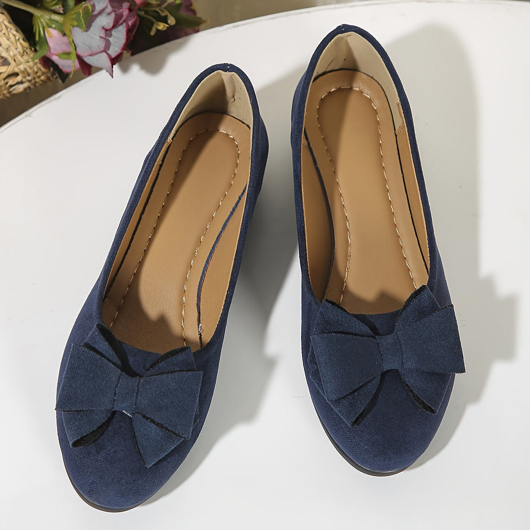 Ballerine donna per ogni occasione, suola imbottita e fiocco per un tocco di classe.