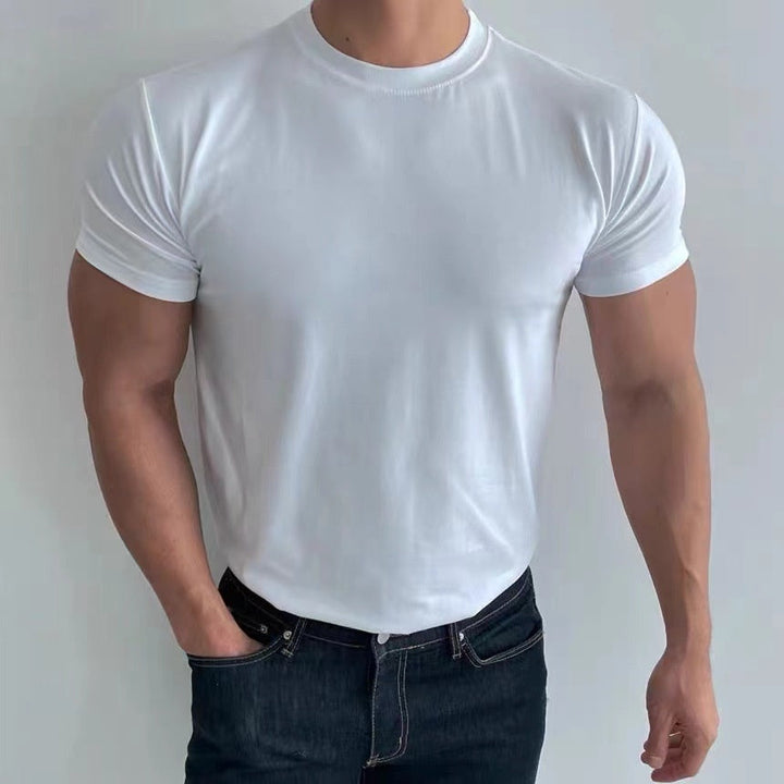 Maglietta sportiva uomo slim fit ad asciugatura rapida, per l'estate. Offre comfort e traspirabilità in ogni attività.