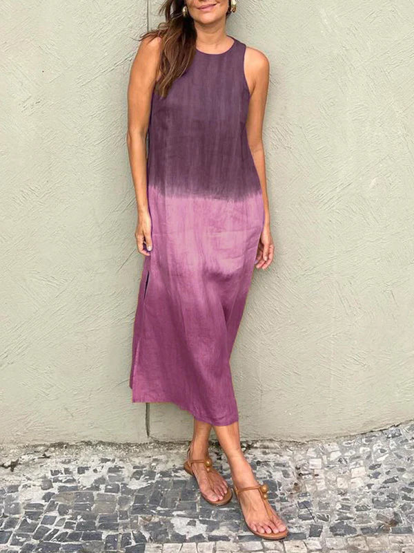 Moda donna: abito lungo fluttuante dai colori naturali. Vestito midi elegante, perfetto per primavera.