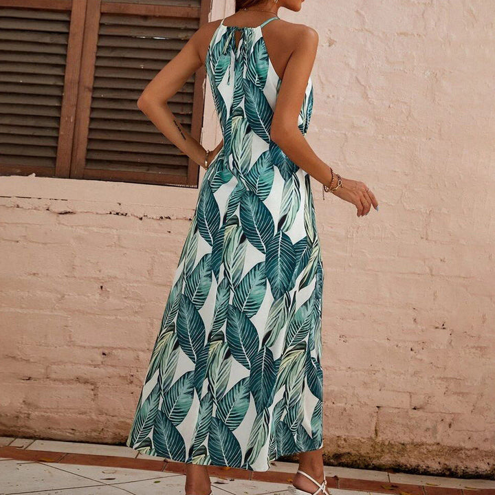 Abito donna midi estivo verde con gonna fluida, scollo all'americana. Ideale per comfort e stile in vacanza.