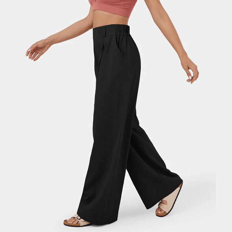 Comodi pantaloni femminili a gamba ampia, vita alta e tasche, per un comfort senza rinunce.