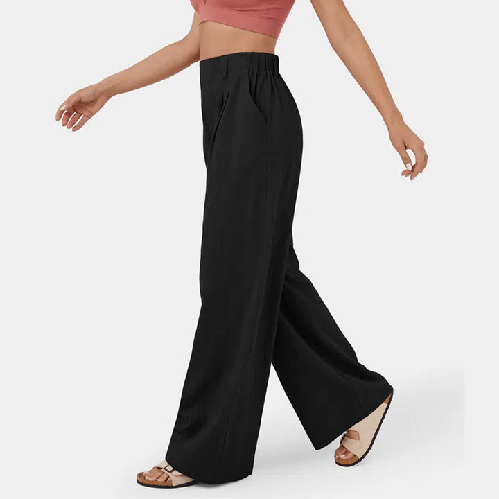 Comodi pantaloni femminili a gamba ampia, vita alta e tasche, per un comfort senza rinunce.