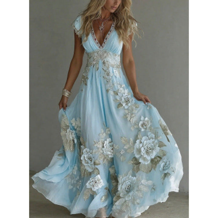 Abito lungo donna in chiffon elegante con pizzo floreale ricamato, perfetto per cerimonie estive.