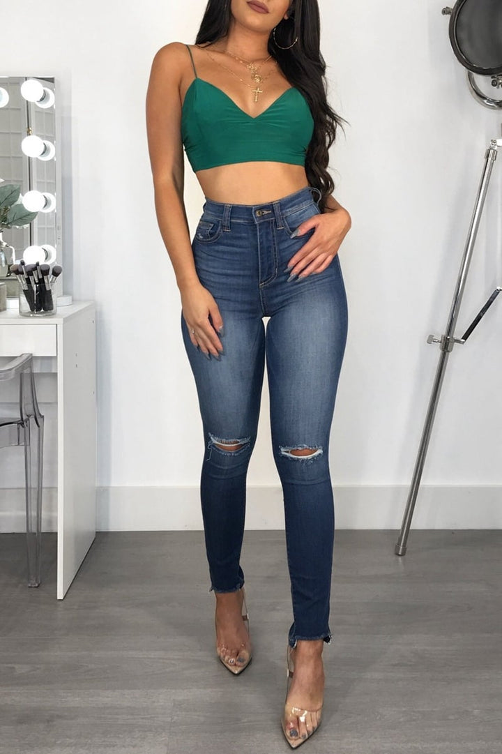 Jeans donna blu slim fit a vita media con push-up, per una silhouette valorizzata e alla moda.