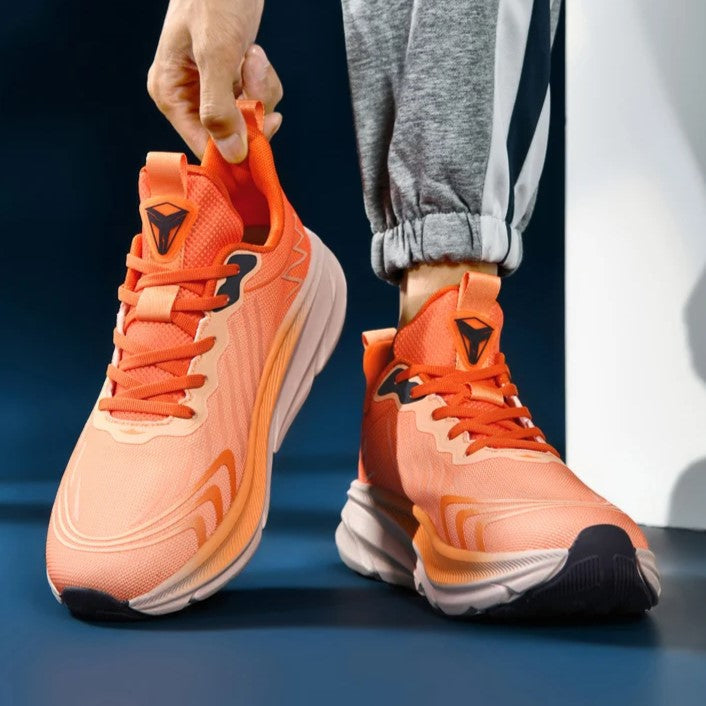 Sneakers da running donna traspiranti, con ammortizzazione avanzata e supporto laterale.