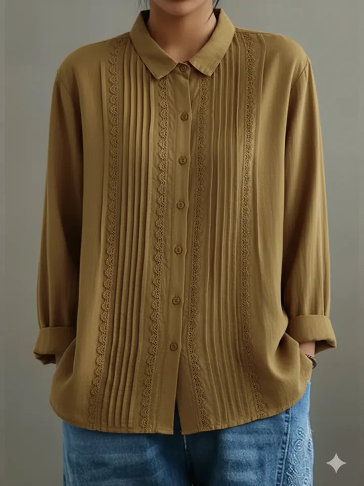 Camicia donna con pizzo, bottoni e maniche lunghe, leggera e confortevole, per un look versatile.