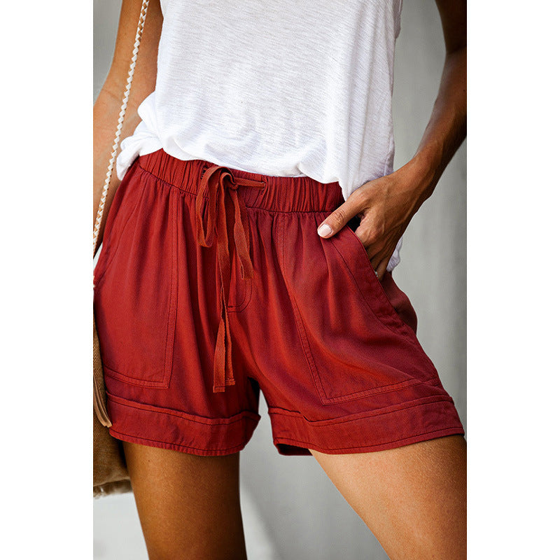 Pantaloncini donna leggeri e freschi, con vita alta e gamba ampia, ideali per l'estate e le vacanze.