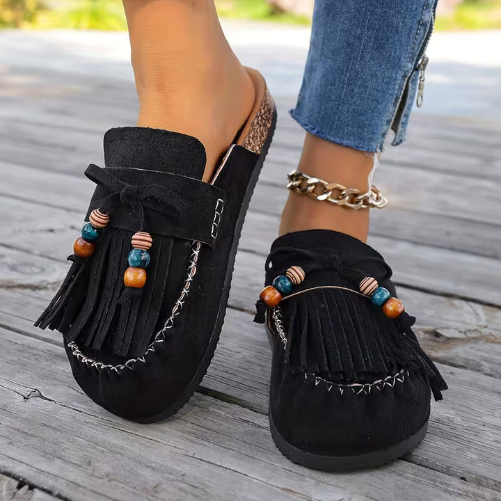 Sandali donna casual con nappe, stile boho estivo, per passeggiate e comfort quotidiano.