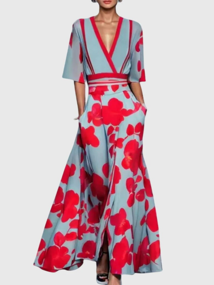 Abito lungo floreale da donna elegante per ospite di matrimonio autunnale, ideale per cerimonie ed eventi serali.