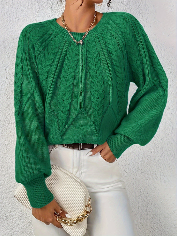 Maglione donna con trecce, maniche a palloncino. Perfetto per serate autunnali.