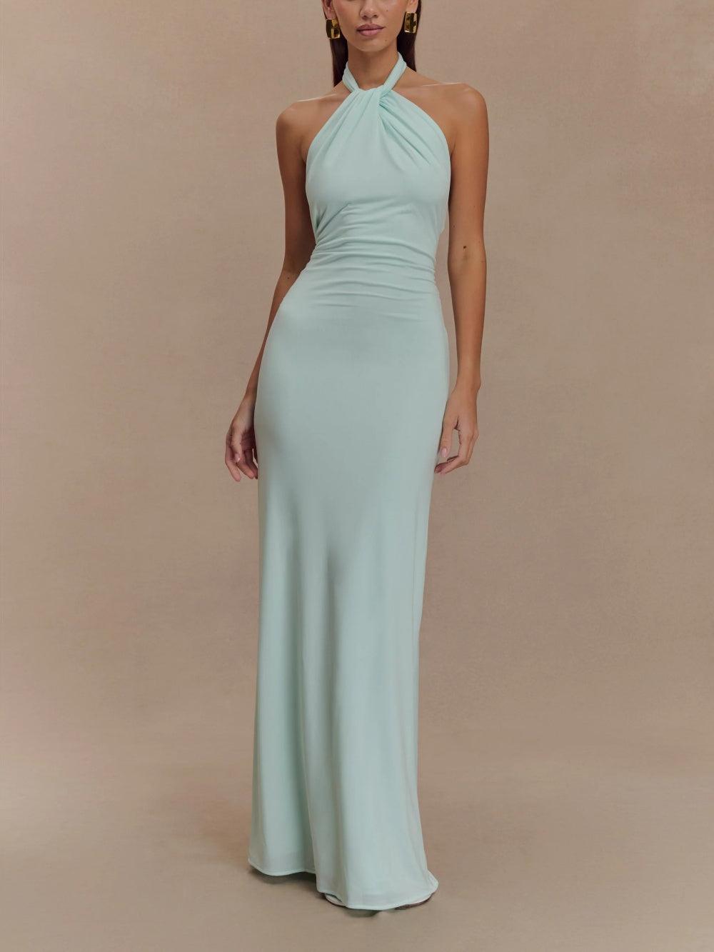 Abito maxi da donna elegante, allacciato al collo, perfetto per serate speciali e cerimonie fluide.