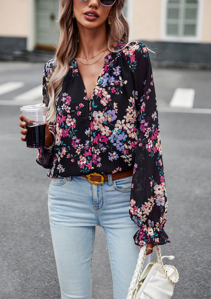 Blusa donna floreale autunnale, maniche lunghe, scollo a V. Ideale per look eleganti e casual.