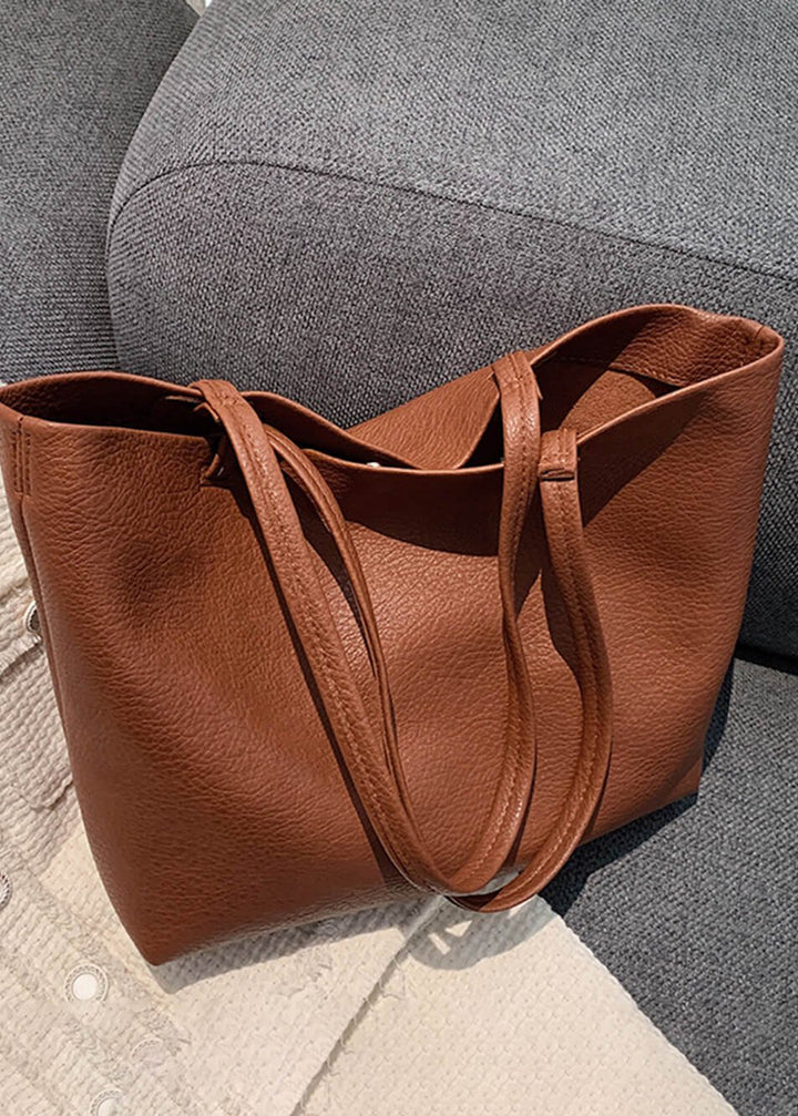Borsa tote donna marrone, accessorio moda elegante e capiente. Perfetta per ogni occasione e stile.