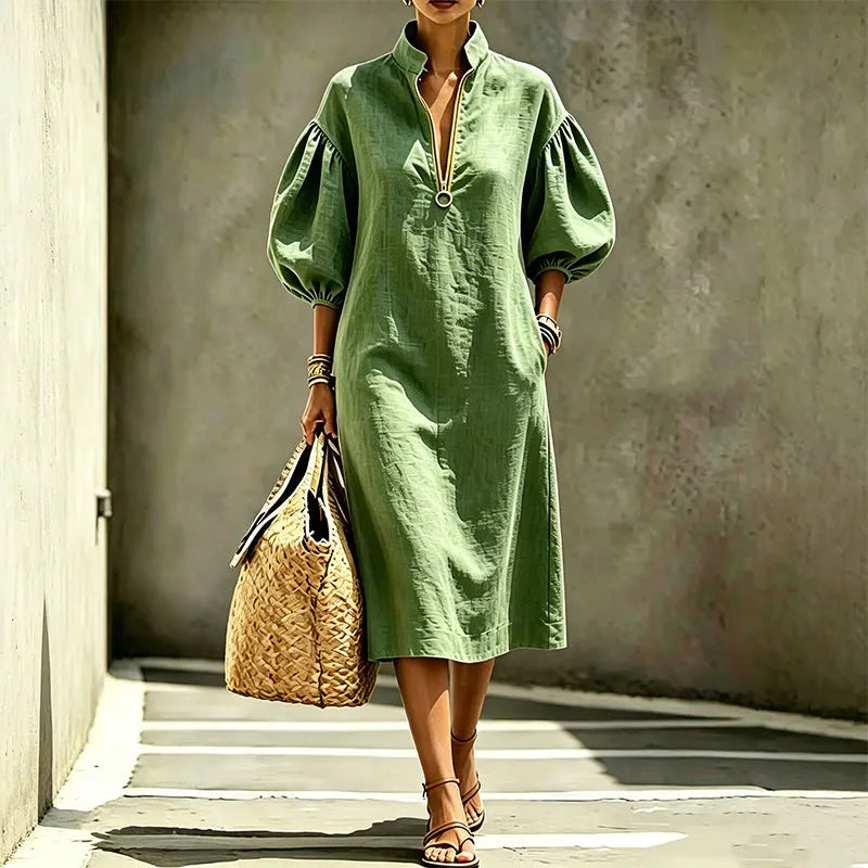 Abito A-line midi per donna, con maniche a sbuffo e chiusura zip, un capo elegante e di tendenza.