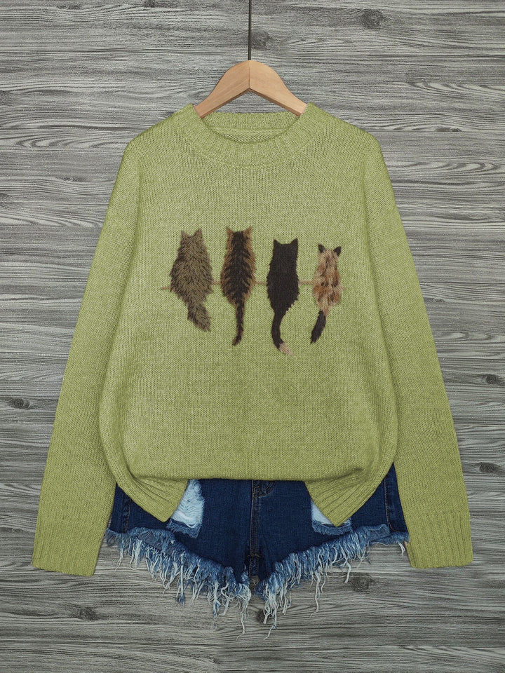 Maglione viola donna, oversize con gatti. Girocollo per comfort e look casual.