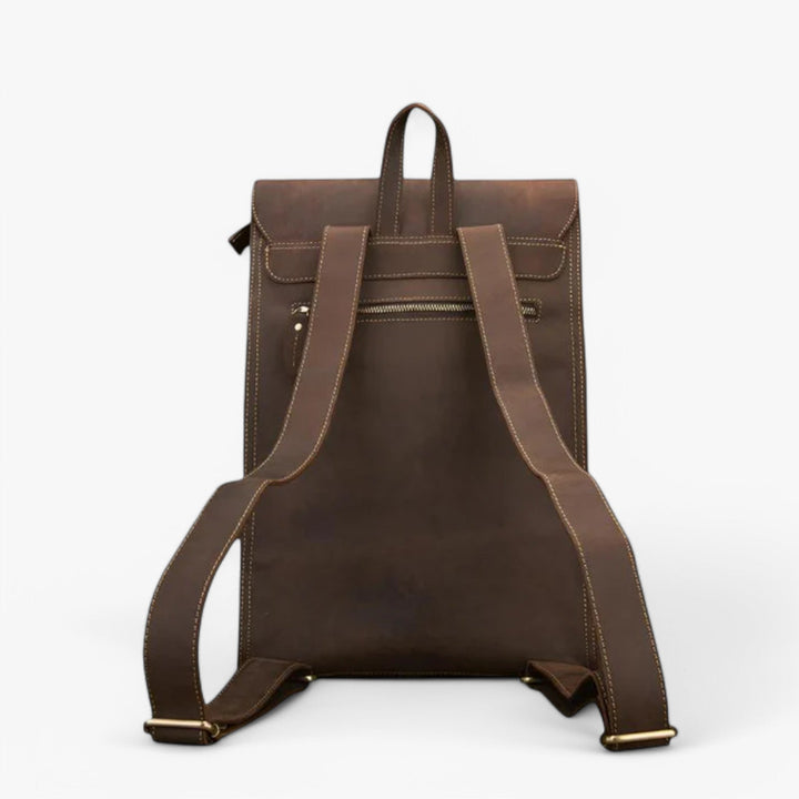 Accessorio zaino minimalista unisex marrone, ottimo per un look sofisticato e praticità quotidiana.