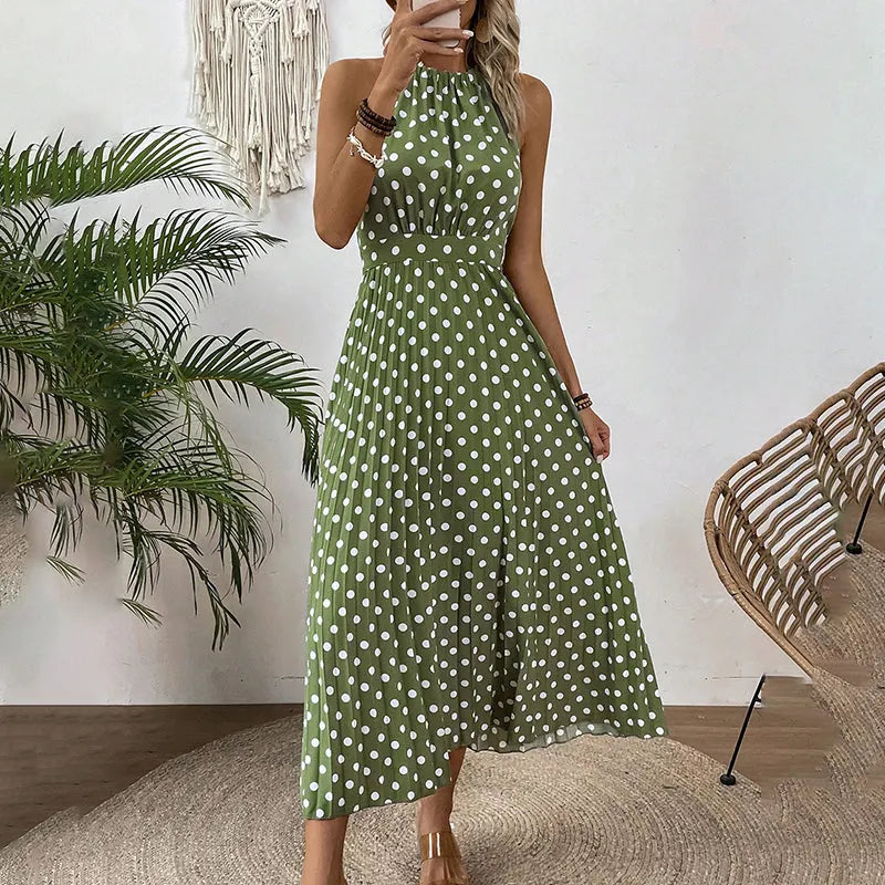 Abito estivo maxi da donna a pois, con collo halter, versatile per occasioni casual ed eleganti.