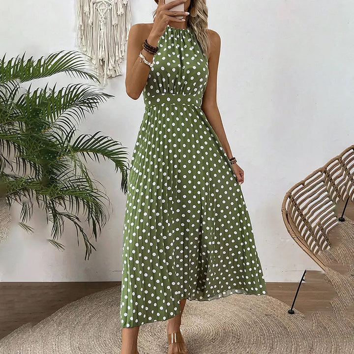 Abito estivo maxi da donna a pois, con collo halter, versatile per occasioni casual ed eleganti.