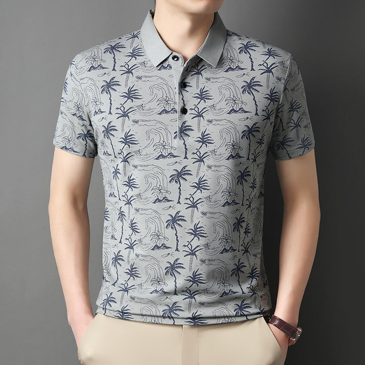 Polo uomo floreale grigia, vestibilità slim, perfetta per l'abbigliamento estivo casual chic.