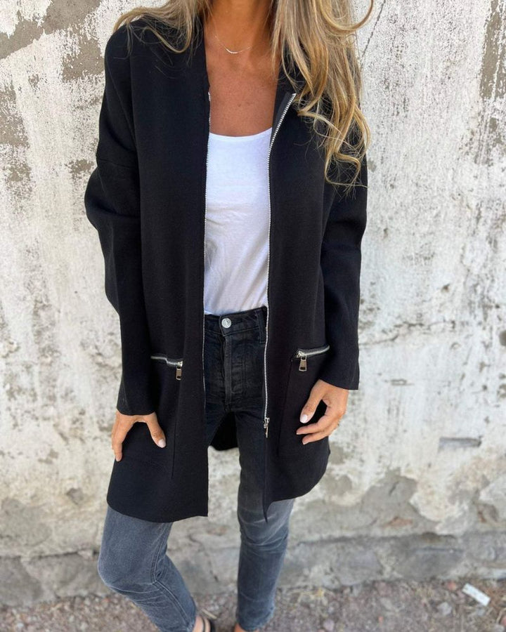Cardigan donna con zip, lunghezza versatile per outfit eleganti o casual. Un must-have per la moda femminile.