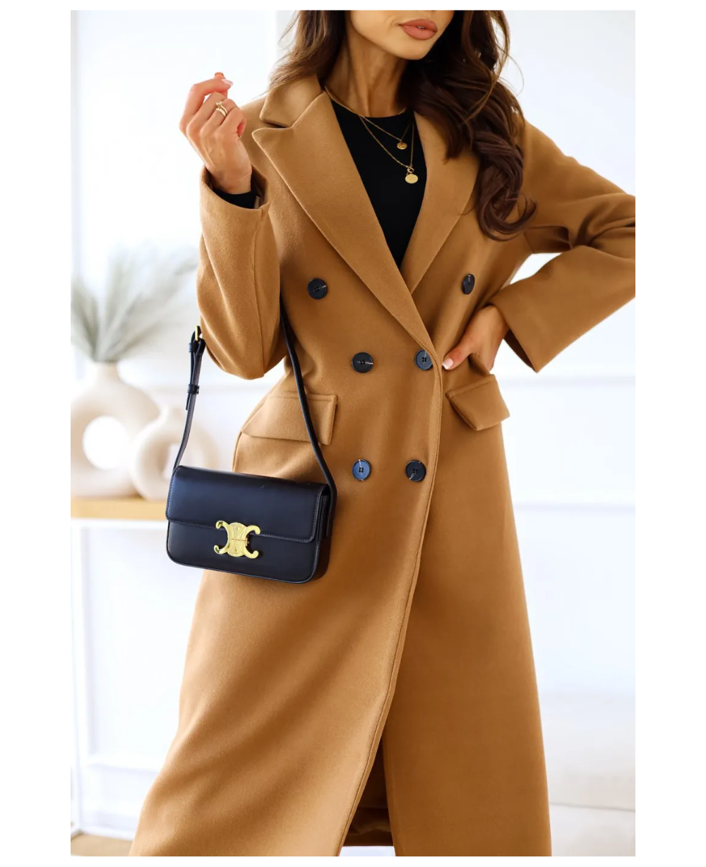 Cappotto trench da donna, lungo e aderente, un capo intramontabile.