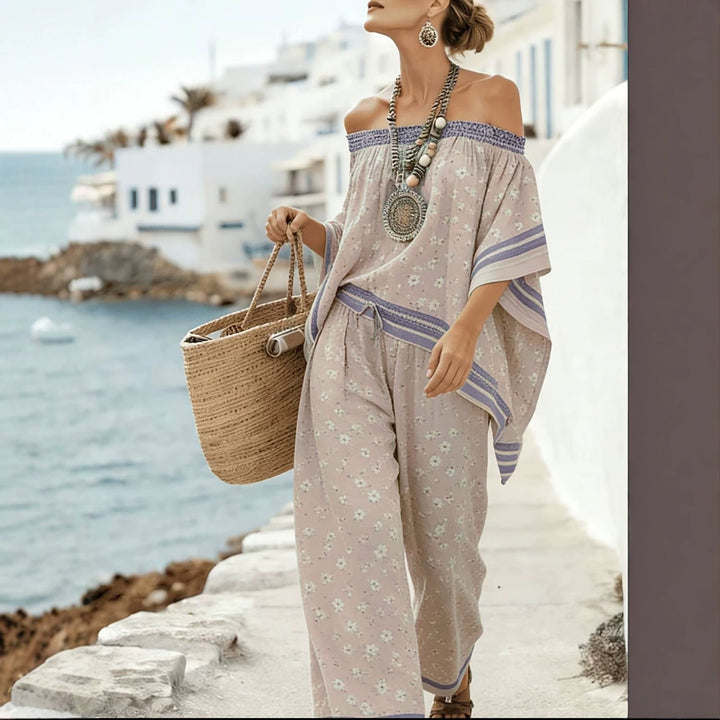 Top monospalla e pantaloni ampi vita alta. Set donna rosa, completo chic ideale per la stagione calda.