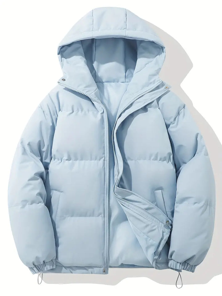 Giacca uomo trapuntata anti-vento, con pratico cappuccio. Comfort e stile per la moda maschile invernale.