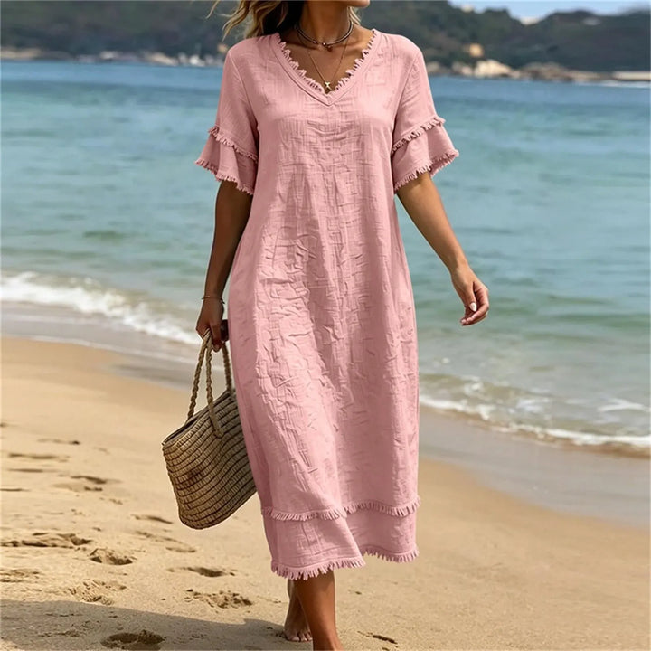 Vestito estivo donna bohémien in poliestere, scollo a V e frange decorative.
