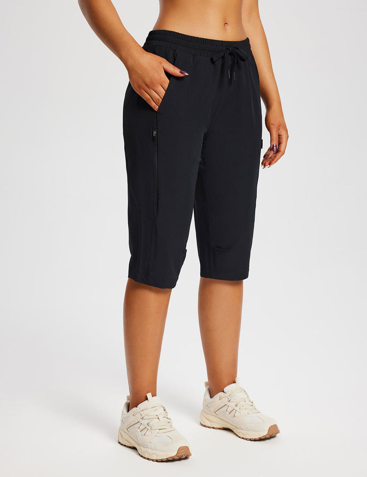 Capri sportivi donna con tasche, perfetti per campeggio e giornate al lago.