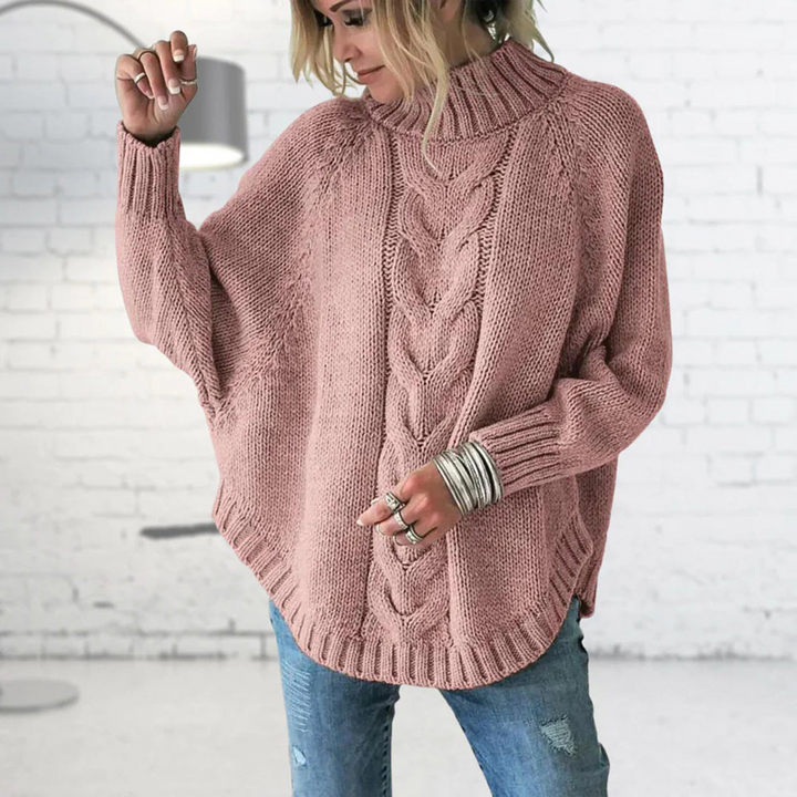 Elegante maglione dolcevita donna grigio, ampio e confortevole con maniche lunghe, perfetto per l'inverno.