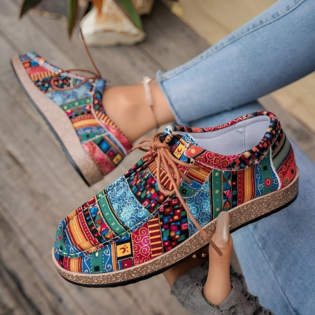 Scarpe sneakers donna con stile artistico unico, leggere e ammortizzate per uso quotidiano e moda casual.