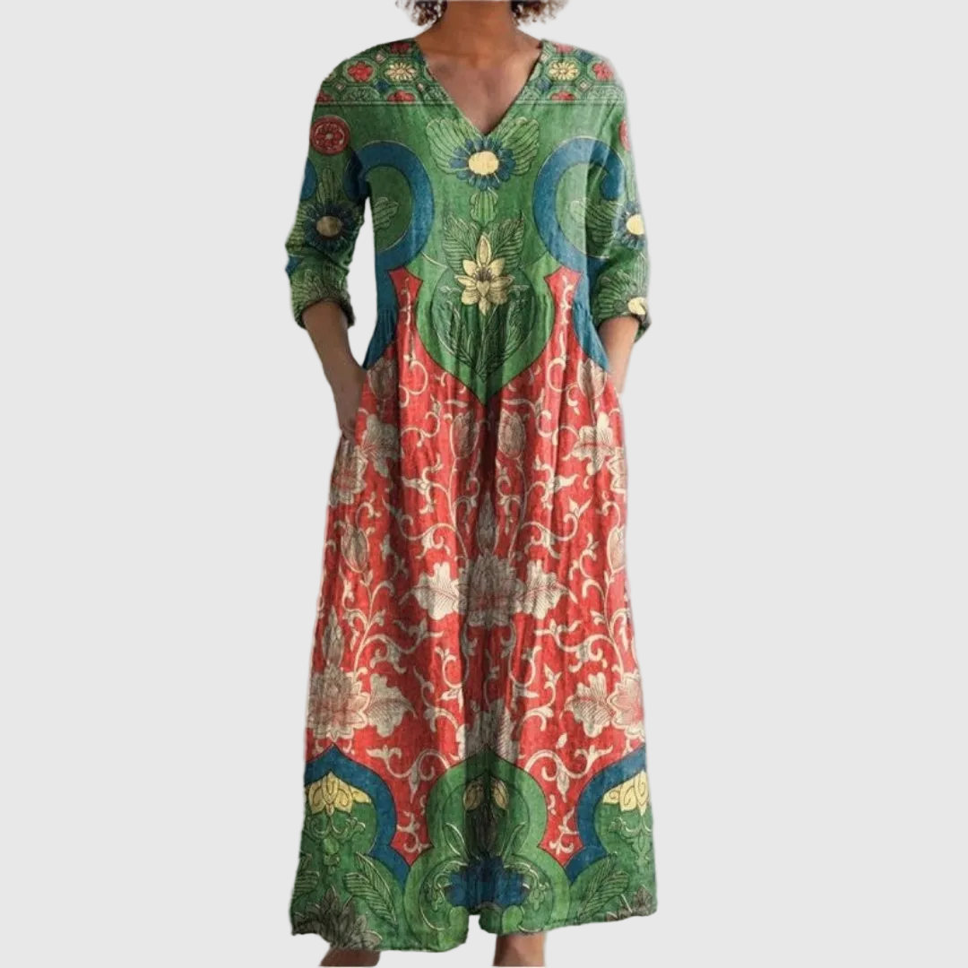 Abito maxi floreale vintage da donna, elegante e fluido, perfetto per look estivi romantici o casual chic.