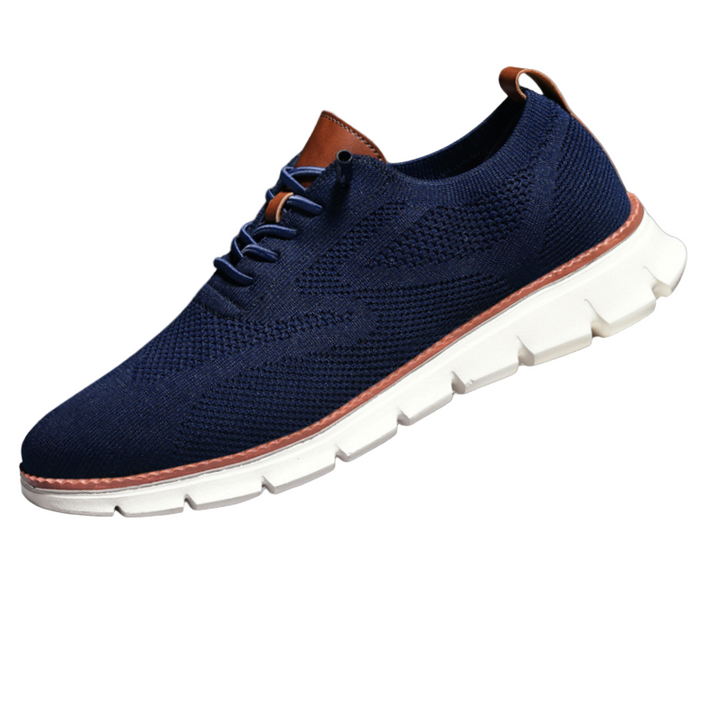 Veduta dall'alto sandali ortopedici uomo, perfetti per passeggio, benessere piedi e comfort estivo.