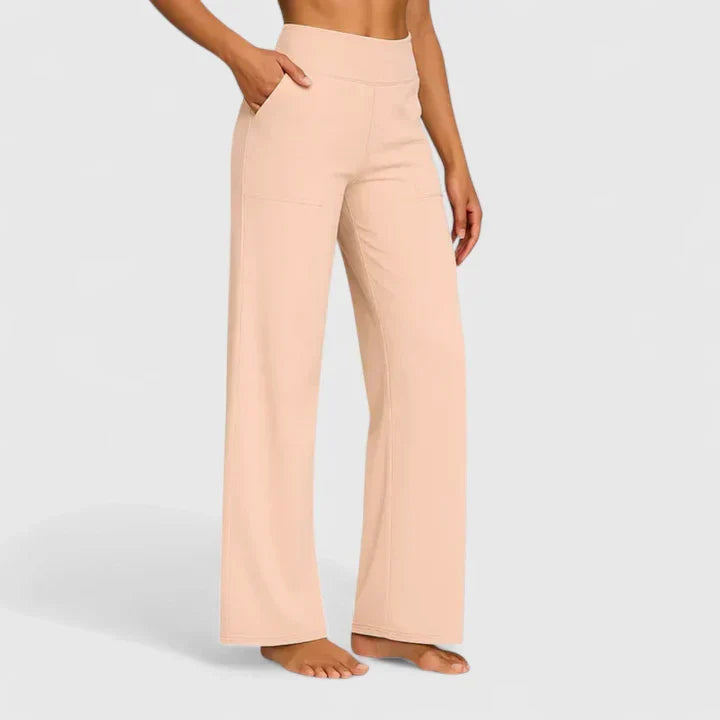 Silhouette slanciata con pantaloni donna a gamba dritta e vita alta, perfetti per ogni figura e tendenza.