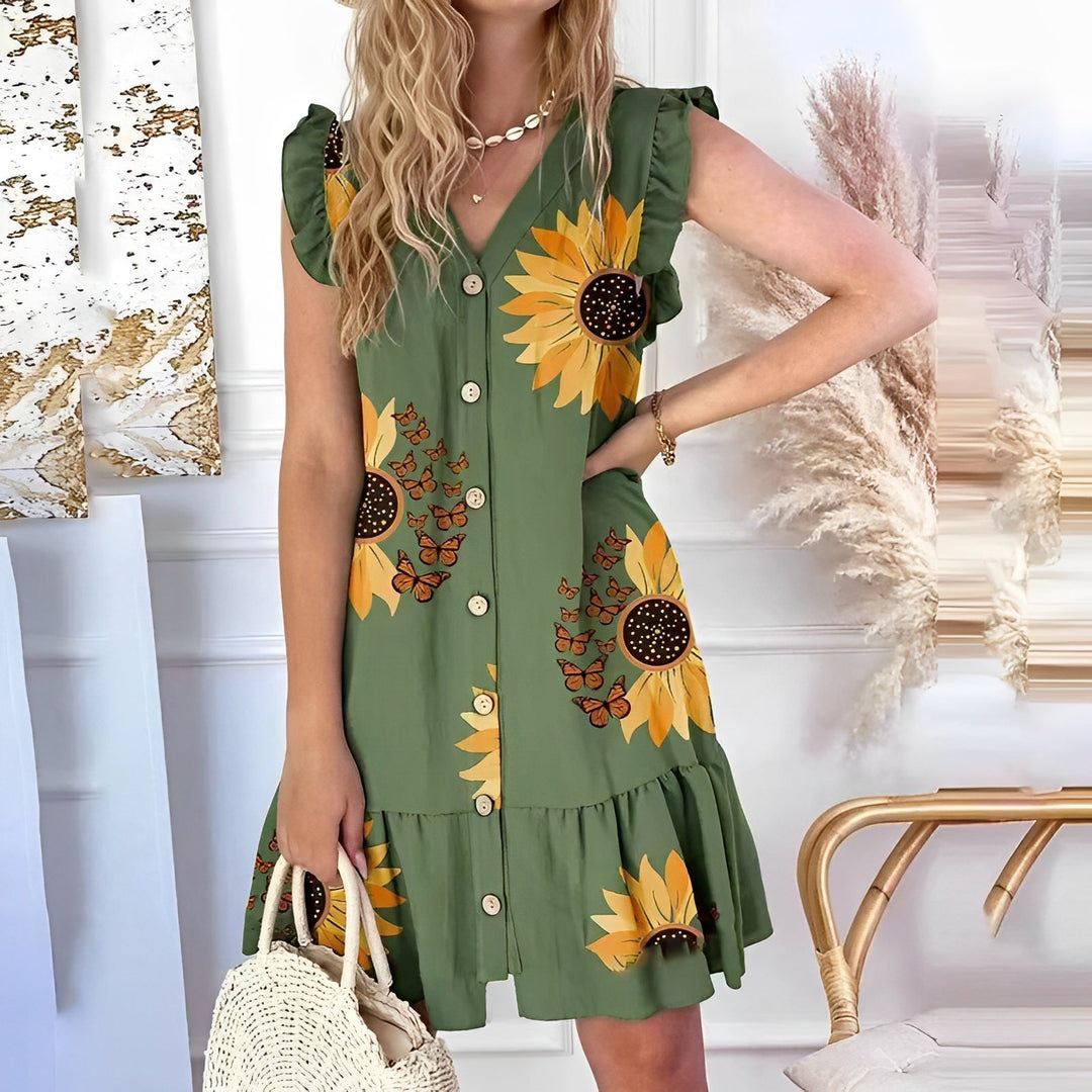 Vestito corto estivo donna senza maniche, con vivace fantasia floreale. Ideale per la moda estiva casual.