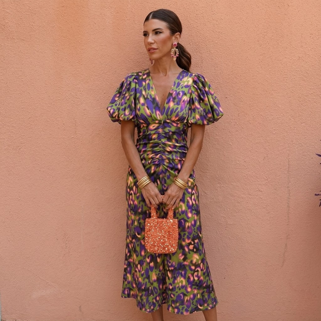 Vestito elegante donna per eventi primaverili ed estivi, scollo a V e maniche a sbuffo trendy.