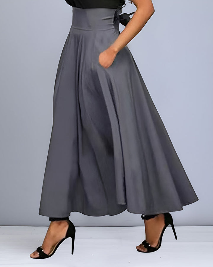 Gonna donna vita alta, gonna lunga autunnale, elegante e moderna. Abbigliamento donna alla moda.